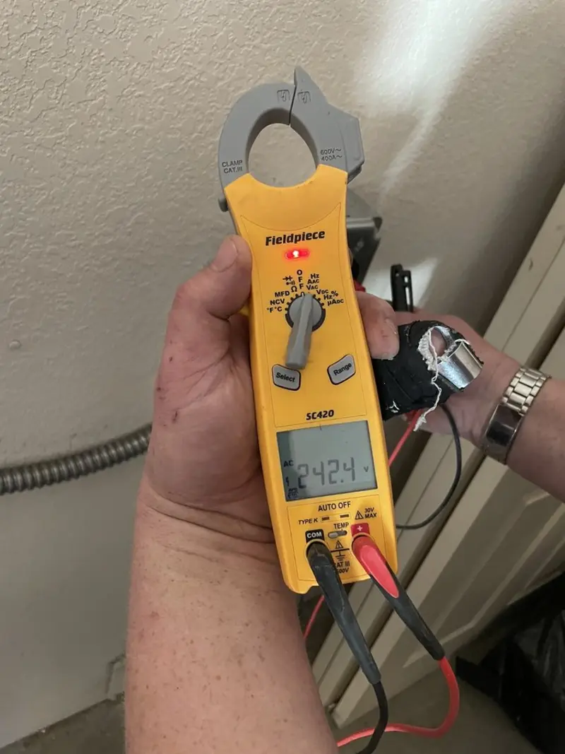 Voltage testing with clamp meter during Generator Installation in Groveland